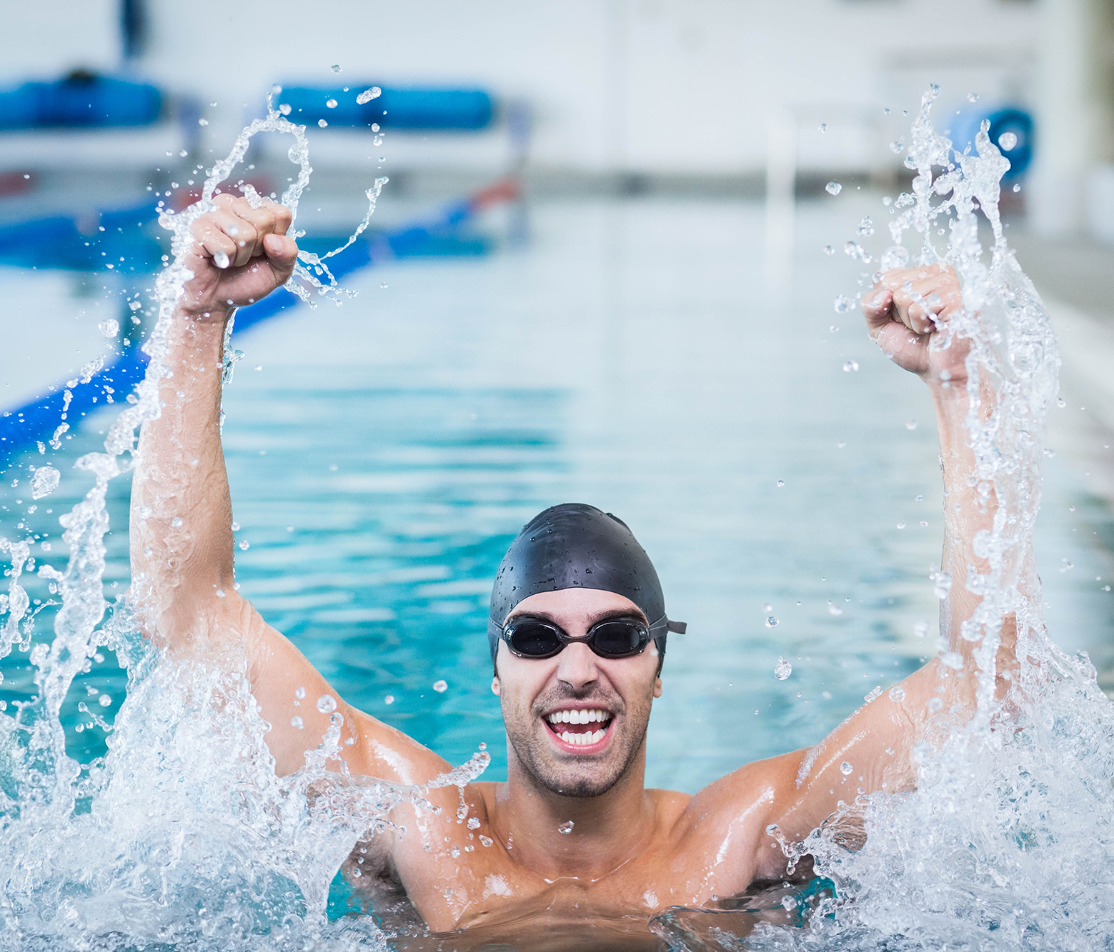 man triumphing IN pool